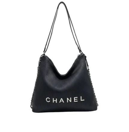 Chanel | Hobo Shoulder Bag With A Ribbed Texture And Silver Chain Straps.